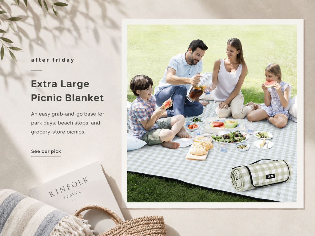 Extra-large green and white picnic blanket set up in a sunny park for an easy Labor Day weekend picnic.