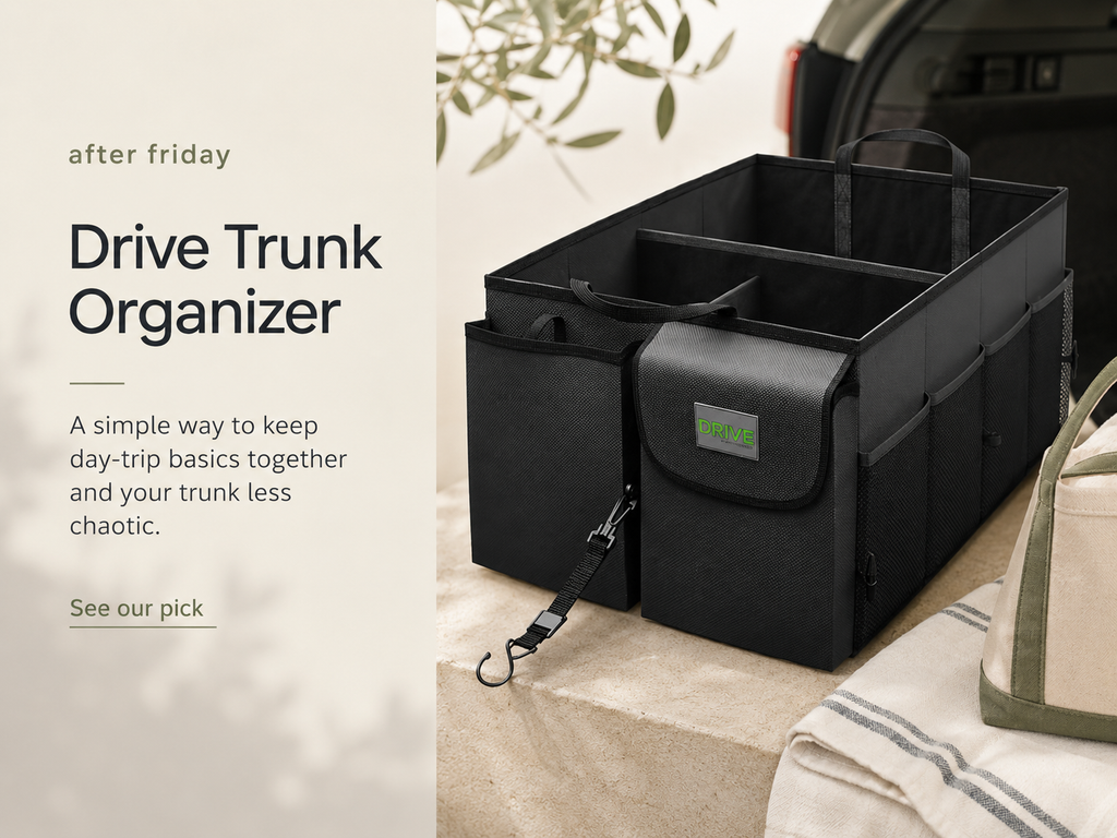 DRIVE black trunk organizer in an open car trunk with space for blankets, bags, and weekend outing essentials.