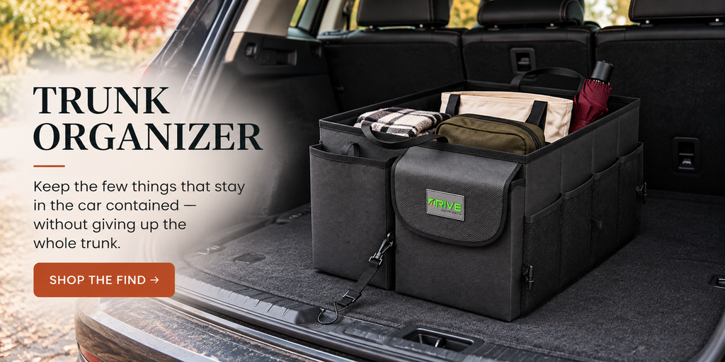 DRIVE black trunk organizer holding a few everyday car essentials inside a spacious SUV cargo area.