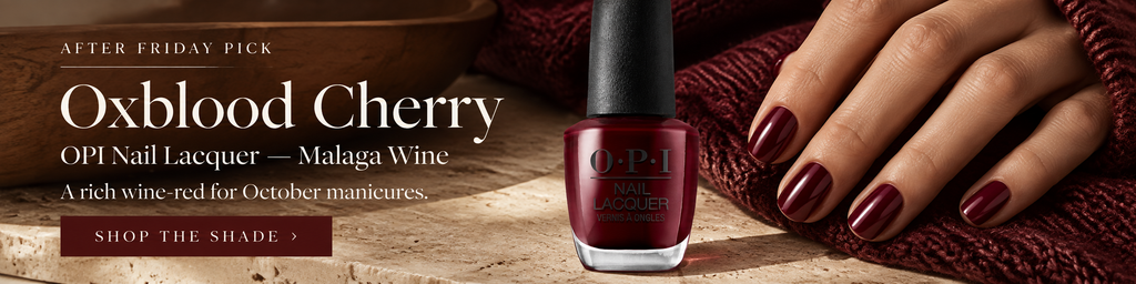 OPI Malaga Wine nail polish styled as a deep oxblood red shade for October.