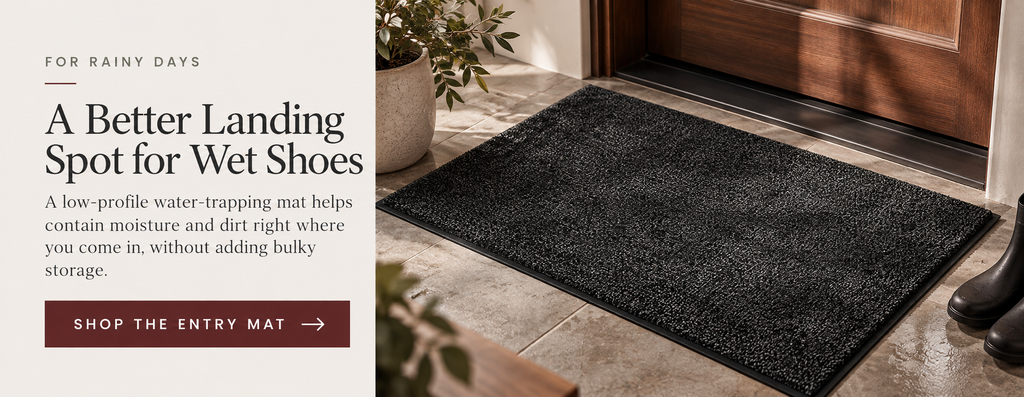 Editorial product card featuring a charcoal indoor entry mat for creating a defined wet-weather landing zone by the front door.