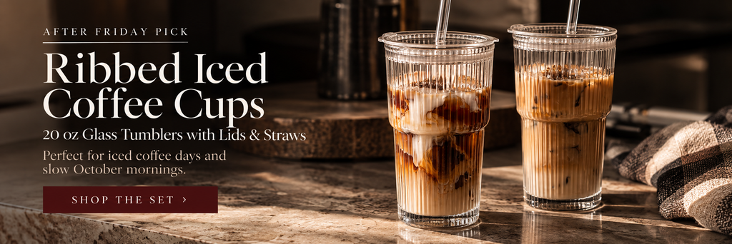 Set of ribbed glass iced coffee tumblers with lids and glass straws filled with maple-vanilla iced coffee.