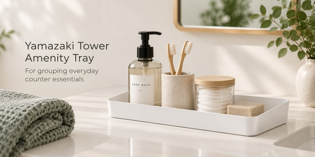 White Yamazaki Tower amenity tray styled with everyday bathroom essentials on a clean vanity.